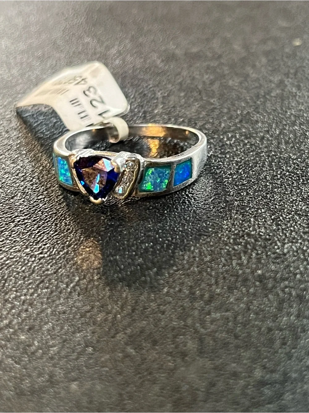 Sterling silver ring with blue center stone and opal inlay. Cz accents. Sz 8 New